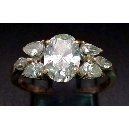 101 - An 18K Gold 4ct Diamond Ring. A breath-taking 3ct Central diamond with a further 1ct of diamonds on ... 