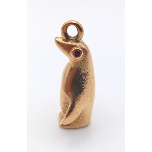 270 - A mid century stylised 9ct yellow gold charm in the form of a penguin by Hans Georg Maunter. It is a... 