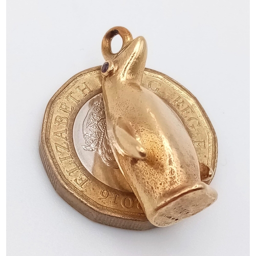 270 - A mid century stylised 9ct yellow gold charm in the form of a penguin by Hans Georg Maunter. It is a... 