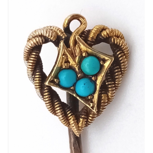 312 - A Victorian 15k gold turquoise-set, heart stick pin. Length 50mm. Weight 1.8g