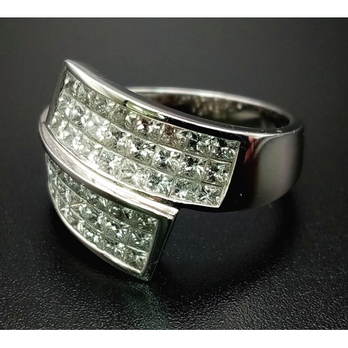 347 - An 18 K white gold ring with two triple bands of round cut quality diamonds (1.73 carats). Ring size... 