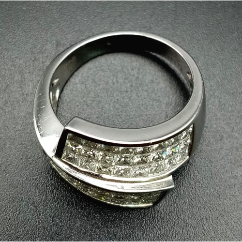 347 - An 18 K white gold ring with two triple bands of round cut quality diamonds (1.73 carats). Ring size... 