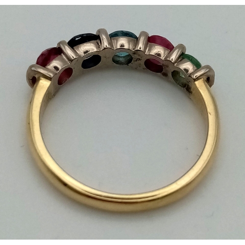 556 - An 18 K yellow gold ring with five round cut gems: Garnet, sapphire, topaz, ruby and emerald. Ring s... 