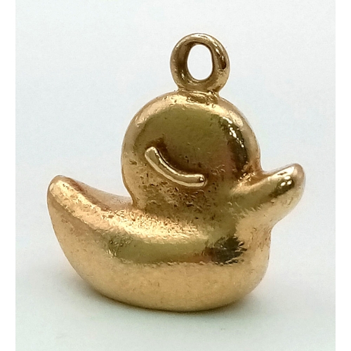 628 - A mid century stylised 9 carat yellow gold charm in the form of a rubber duck by Hans Georg Maunter.... 