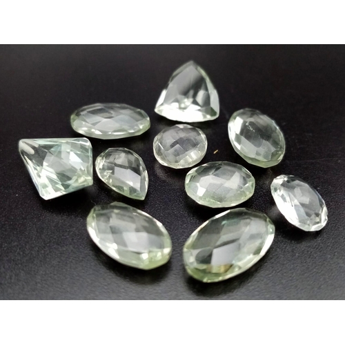 712 - A lot of 34.75 Ct Faceted Transparent Clear Green Amethyst Gemstones