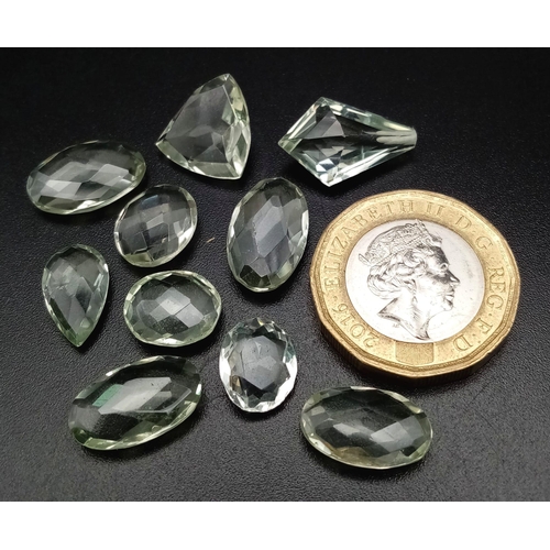 712 - A lot of 34.75 Ct Faceted Transparent Clear Green Amethyst Gemstones