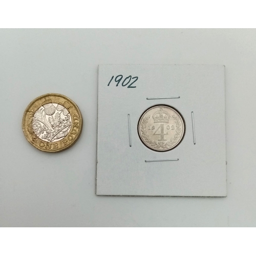 802 - A 1902 Uncirculated Silver Maundy 4 Pence Coin. In a protective wallet.