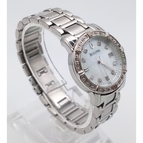 829 - A BULOVA LADIES WATCH WITH DIAMOND NUMERALS AND BEZEL.  30mm