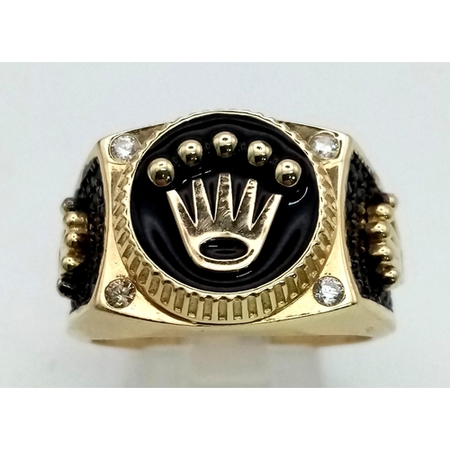 882 - A 14 K yellow gold crown ring with black sapphires. Ring size: V, weight: 9.61 g. In a presentation ... 