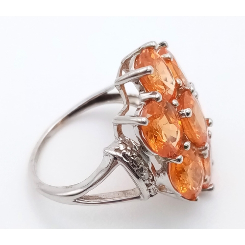 930 - New Limited Edition of 63 Pieces Sterling Silver Tangerine Garnet & Diamond Ring Size J. 8.11 Total ... 