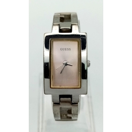 993 - Guess steel bracelet watch. In full working order, as found.