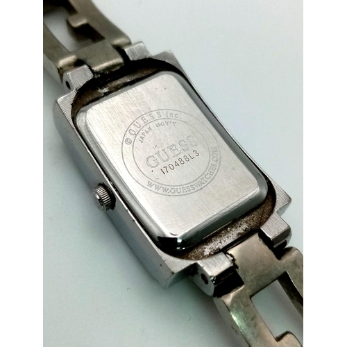 993 - Guess steel bracelet watch. In full working order, as found.