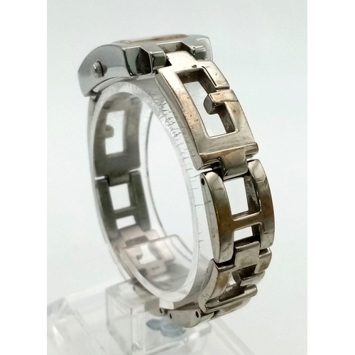 993 - Guess steel bracelet watch. In full working order, as found.