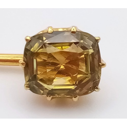 219 - A Beautiful Victorian High Karat Gold Chrysoberyl Stick Pin.
6cm. 2.1g total weight.