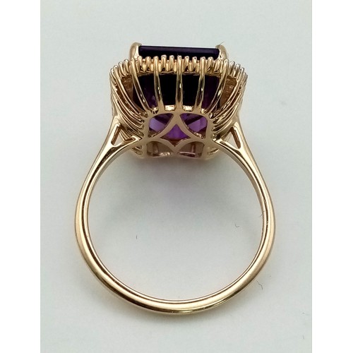 107 - A  Show-Stopping 9K Yellow Gold Amethyst and Diamond Ring. A huge high-quality 8ct Amethyst surround... 