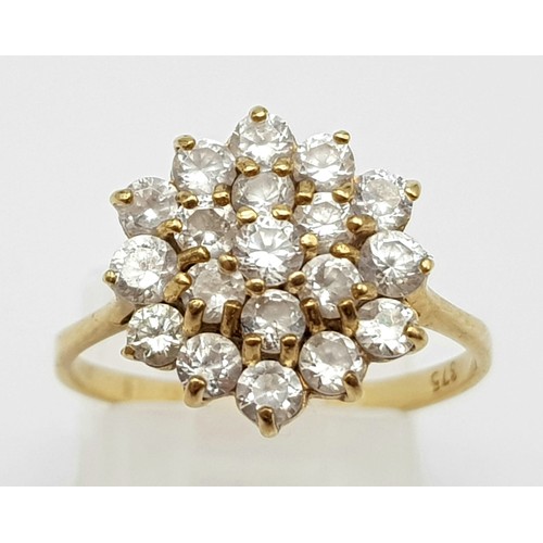 642 - A 9K Yellow Gold White Stone Cluster Ring.  Size O/P. 2.26g total weight.