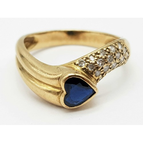 648 - A 9K Yellow Gold Sapphire Heart and Diamond Wave Love Ring. Size O. 3.51g total weight.