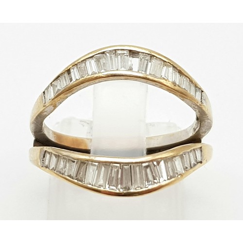 210 - A High Karat (tested) Yellow Gold Graduated Baguette-cut Diamond Ring. Size N. 4.76g total weight. N... 