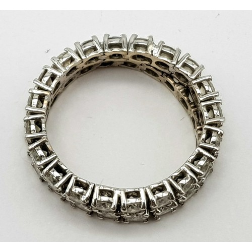 115 - An 18K White Gold 40 Diamond Full Eternity Ring. Double-row chain-link with 2.8ct of round cut diamo... 