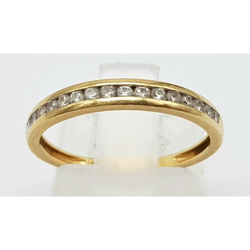 609 - 18k yellow gold diamond 1/2 eternity ring. 0.18ct, 1.8g, size M.