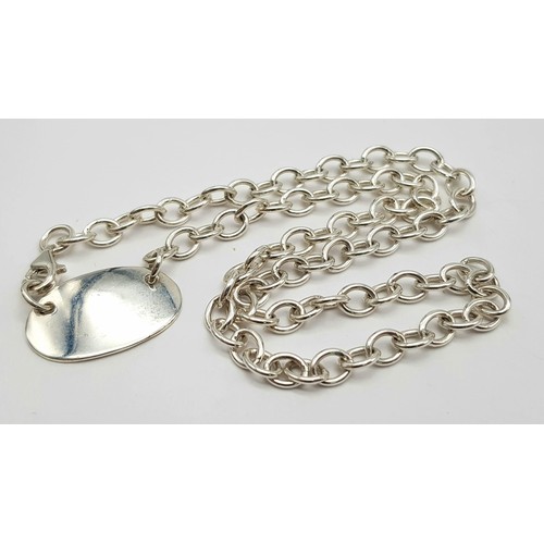 889 - Sterling silver ID necklace. 17.5g in weight.