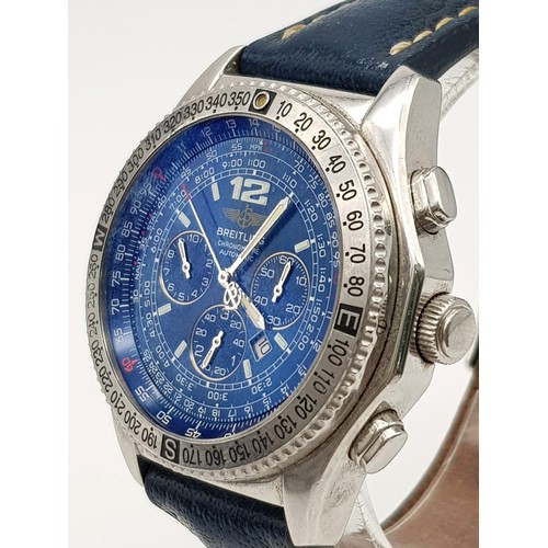 82 - A BREITLING AUTOMATIC CHRONOMETER WITH DATE BOX AND 3 SUBDIALS AND UNUSUAL BLUE DIAL, COMES IN ORIGI... 