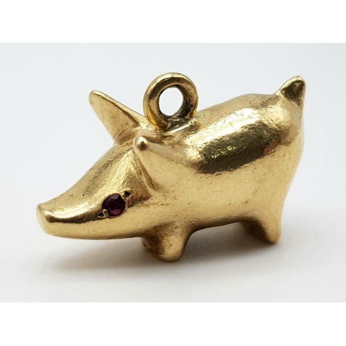 1012 - A mid century stylised 9 carat yellow gold charm in the form of a Pig by Hans Georg Maunter. It is a... 