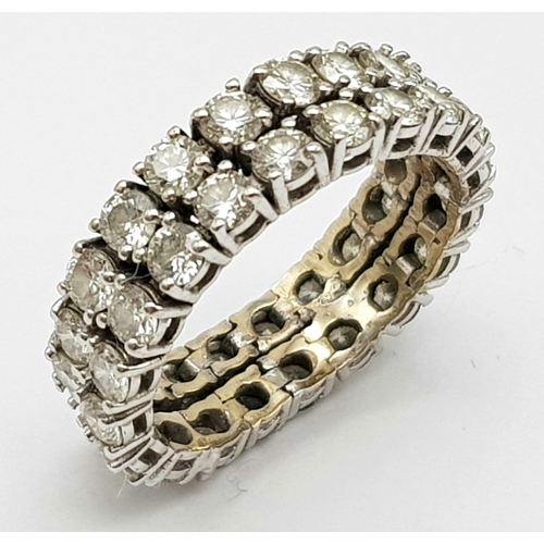 115 - An 18K White Gold 40 Diamond Full Eternity Ring. Double-row chain-link with 2.8ct of round cut diamo... 