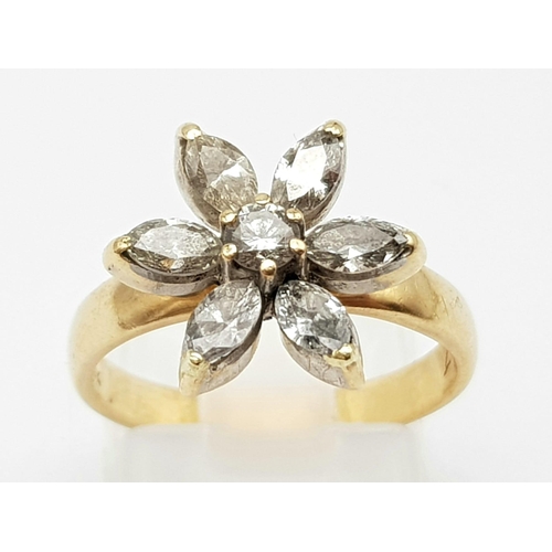 129 - An 18K Yellow Gold Diamond Flower Ring. Central round diamond surrounded by six oval petal diamonds ... 