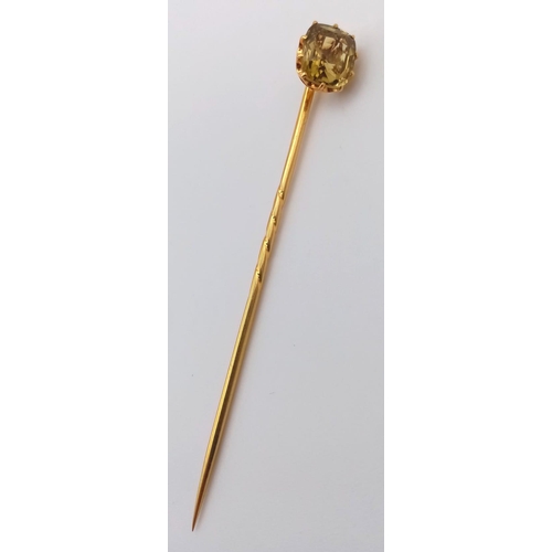 219 - A Beautiful Victorian High Karat Gold Chrysoberyl Stick Pin.
6cm. 2.1g total weight.