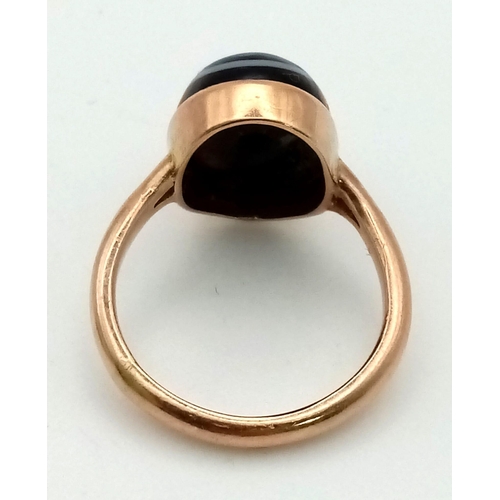 565 - A Rare Antique Bullseye Onyx 9K Gold Ring. Size H. 2.8g total weight.