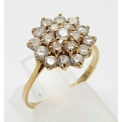 642 - A 9K Yellow Gold White Stone Cluster Ring.  Size O/P. 2.26g total weight.