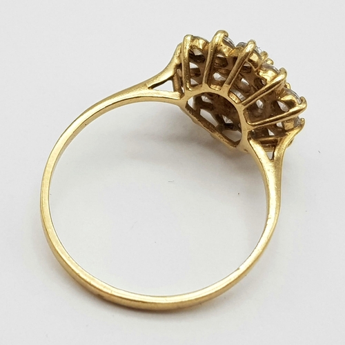 642 - A 9K Yellow Gold White Stone Cluster Ring.  Size O/P. 2.26g total weight.