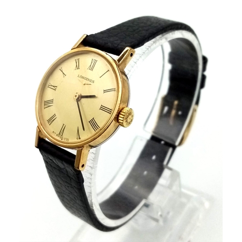 646 - A LONGINES gold plated, Swiss watch, with original leather strap. 24 mm case, in good condition and ... 