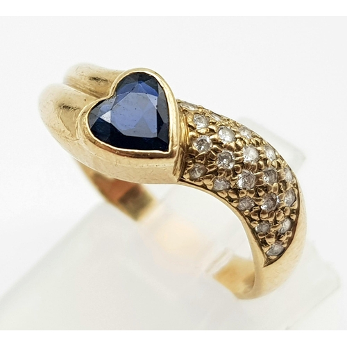 648 - A 9K Yellow Gold Sapphire Heart and Diamond Wave Love Ring. Size O. 3.51g total weight.