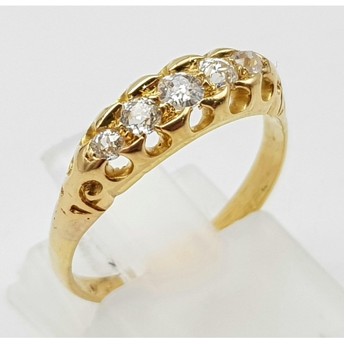 180 - An Antique High Karat Five Diamond Ring. Five bright white, round-cut graduating stones. Size L. 2.5... 