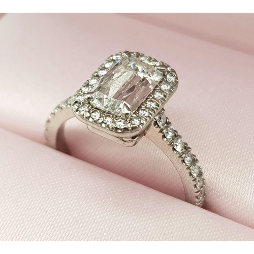 54 - A Boodles Vintage Ashoka-Cut Diamond in Platinum Ring. 1.2ct central diamond with an additional 0.45... 
