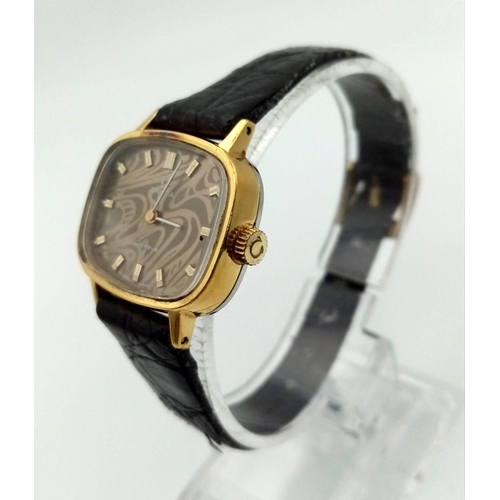 601 - AN OMEGA VINTAGE LADIES WATCH ON ORIGINAL LEATHER STRAP, PATTERNED RECTANGULAR DIAL.  24 X 20mm