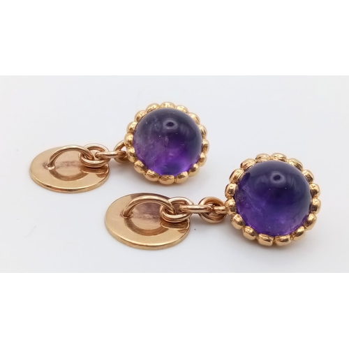 62 - A Wonderful Pair of 1950s Amethyst and High Karat Gold Cufflinks. Beautiful domed amethysts. 10.51g ... 