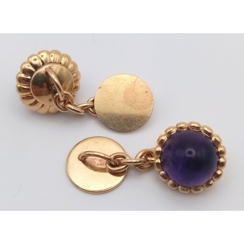 62 - A Wonderful Pair of 1950s Amethyst and High Karat Gold Cufflinks. Beautiful domed amethysts. 10.51g ... 