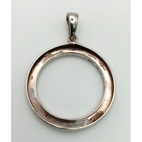 96 - An 18 K white gold  BVLGARI circular pendant. Diameter: 23 mm, weight: 3.18 g.