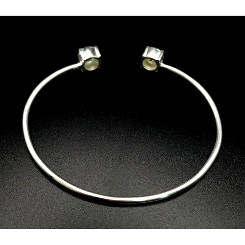 1177 - A 4ct white Moissanite Cuff 925 Silver Bracelet/Bangle. 8.64g total weight.