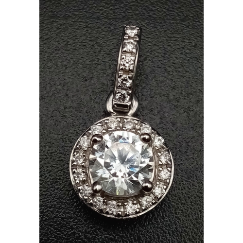 419 - 14k white gold clear stone cluster pendant. 1g in weight.