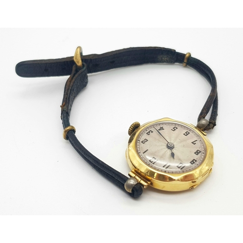 564 - A Vintage 18k Gold Cased Ladies Watch. Mechanical movement in working order but because of age no gu... 