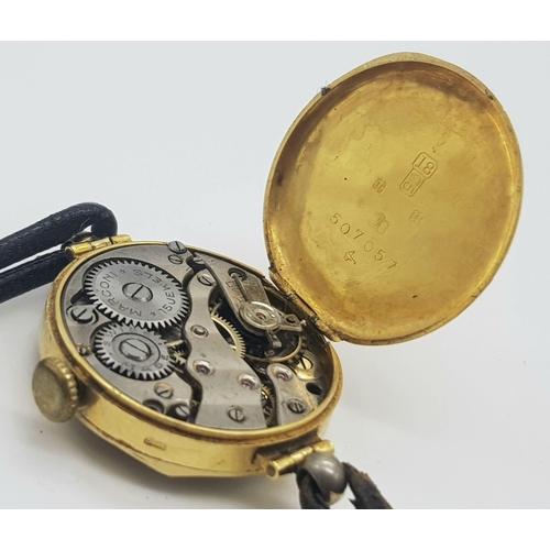 564 - A Vintage 18k Gold Cased Ladies Watch. Mechanical movement in working order but because of age no gu... 