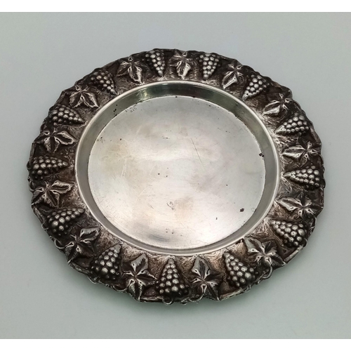 694 - An Antique Silver Kiddush Cup With Plate. Grape decoration. Plate -11cm diameter. Cup 13cm tall. 122... 