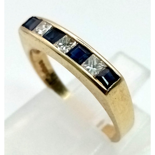 767 - A 9K Yellow Gold Sapphire and Diamond Ring. Princess cut - seven stone ring. Size K/L. 2.08g total w... 