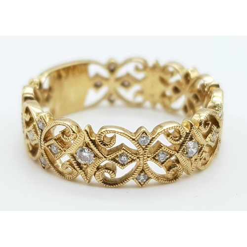 808 - A vintage, 9 K yellow gold ornate ring with diamonds. Ring size: N1/2, weight: 285 g.