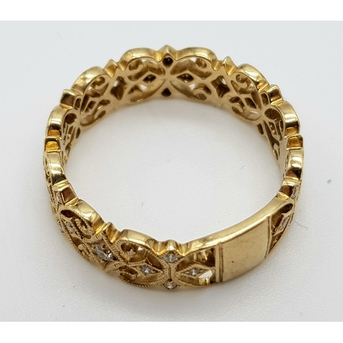 808 - A vintage, 9 K yellow gold ornate ring with diamonds. Ring size: N1/2, weight: 285 g.