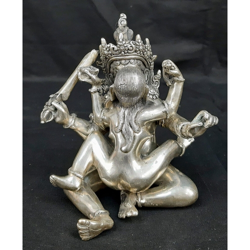 176 - An antique, Tibetan silver, statue, inspired by the ancient Sanskrit text of Kama Sutra. It consists... 